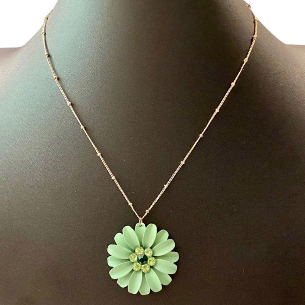 Beautiful Green Flower Necklace on a delicate gold toned chain.